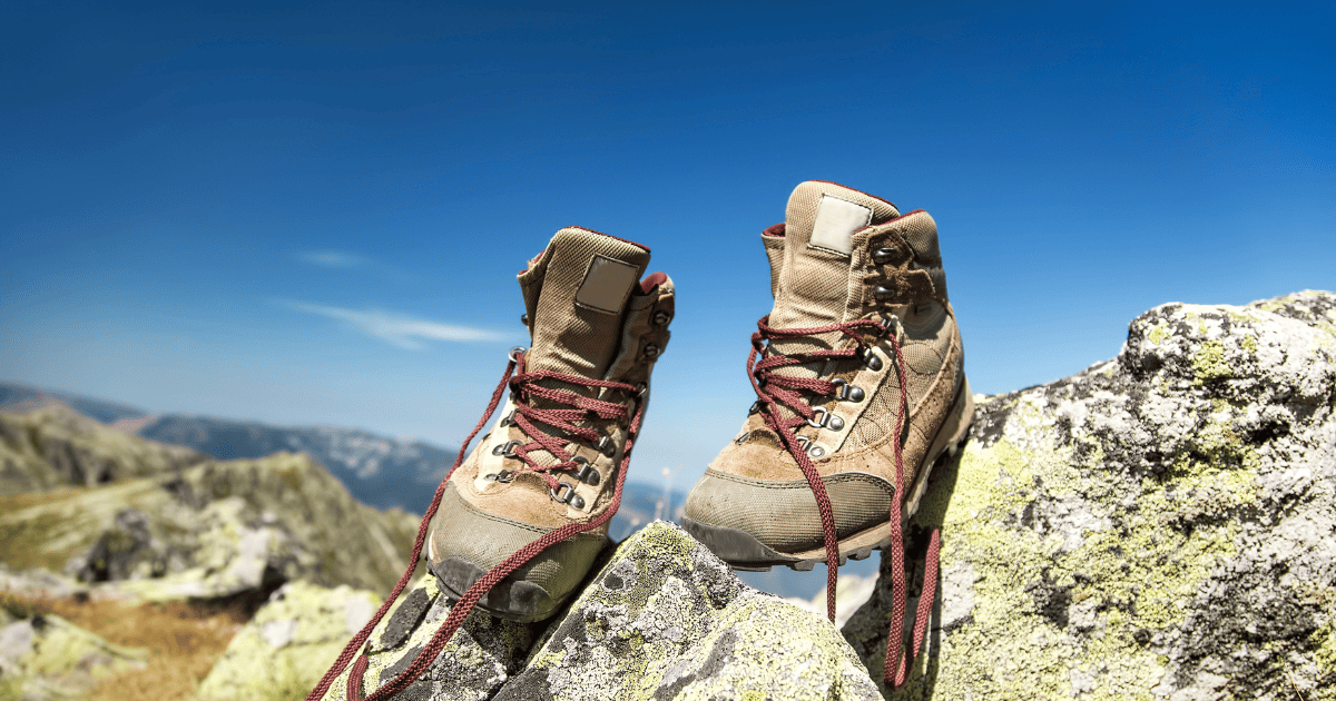 Showing shoes on the mountain after reading how to break in hiking boots.